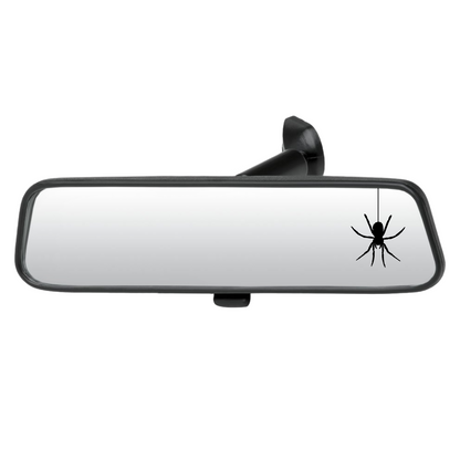 Car rearview mirror with a spider decal on a white background